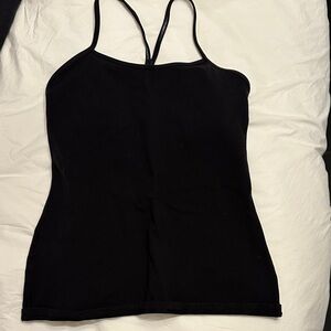 Lululemon black workout top. Older/thick style. Unsure size